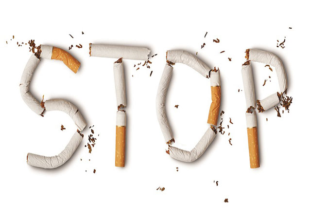 Stop written with cigarettes